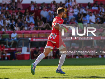 Cristhian Stuani of Girona celebrates after scoring against FC Barcelona during the La Liga EA SPORTS match at Estadi Montilivi in Girona, S...