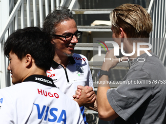 Yuki Tsunoda of RB, Lauren Mekies and Liam Lawson ahead of the Formula 1 Grand Prix of Azerbaijan at Baku City Circuit in Baku, Azerbaijan o...