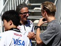 Yuki Tsunoda of RB, Lauren Mekies and Liam Lawson ahead of the Formula 1 Grand Prix of Azerbaijan at Baku City Circuit in Baku, Azerbaijan o...