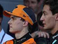 Oscar Piastri of McLaren and George Russell of Mercedes after the Formula 1 Grand Prix of Azerbaijan at Baku City Circuit in Baku, Azerbaija...