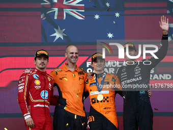 Charles Leclerc of Ferrari, Oscar Piastri of McLaren and George Russell of Mercedes after the Formula 1 Grand Prix of Azerbaijan at Baku Cit...