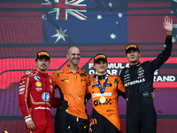 Charles Leclerc of Ferrari, Oscar Piastri of McLaren and George Russell of Mercedes after the Formula 1 Grand Prix of Azerbaijan at Baku Cit...