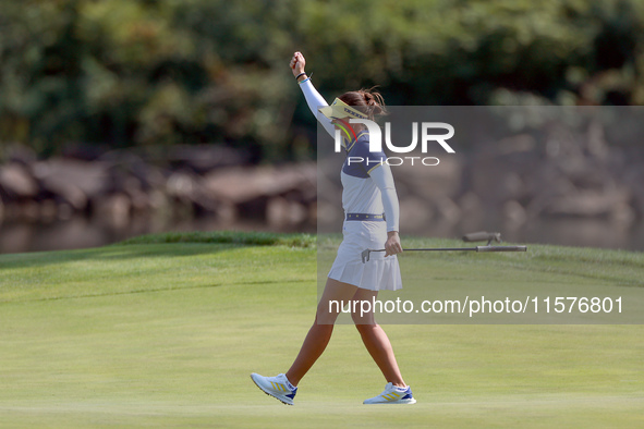 GAINESVILLE, VIRGINIA - SEPTEMBER 15: Linn Grant of Team Europe celebrates her putt on hole 11 during the final round of the Solheim Cup at...