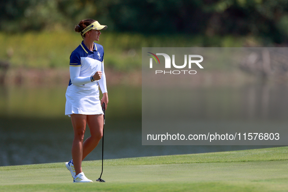 GAINESVILLE, VIRGINIA - SEPTEMBER 15: Linn Grant of Team Europe celebrates her putt on hole 11 during the final round of the Solheim Cup at...