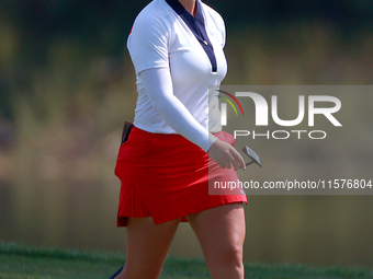 GAINESVILLE, VIRGINIA - SEPTEMBER 15: Jennifer Kupcho of the United States walks on the 11th green  during the final round of the Solheim Cu...