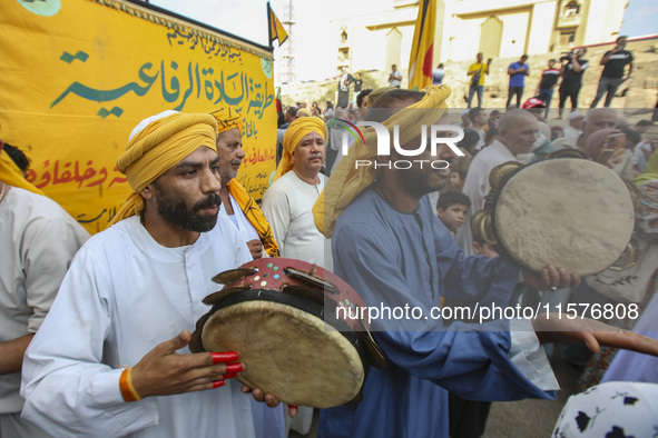 Egyptian Muslims parade to celebrate Moulid Al-Nabi, the birthday of the Prophet Muhammad, in Cairo, Egypt, on September 15, 2024. 