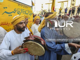 Egyptian Muslims parade to celebrate Moulid Al-Nabi, the birthday of the Prophet Muhammad, in Cairo, Egypt, on September 15, 2024. (