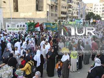 Egyptian Muslims parade to celebrate Moulid Al-Nabi, the birthday of the Prophet Muhammad, in Cairo, Egypt, on September 15, 2024. (