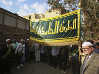 Egyptian Muslims parade to celebrate Moulid Al-Nabi, the birthday of the Prophet Muhammad, in Cairo, Egypt, on September 15, 2024. (