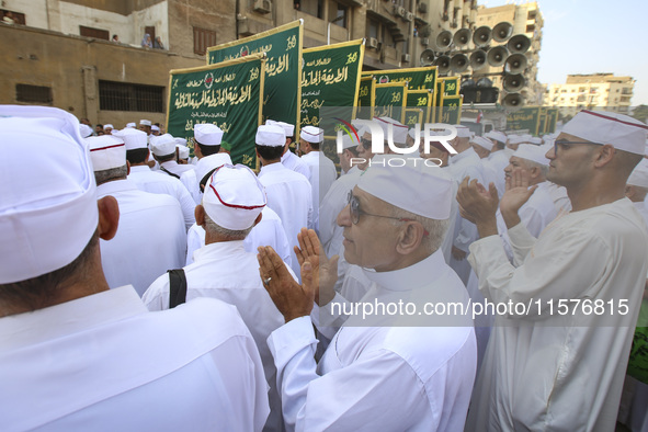 Egyptian Muslims parade to celebrate Moulid Al-Nabi, the birthday of the Prophet Muhammad, in Cairo, Egypt, on September 15, 2024. 