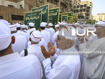 Egyptian Muslims parade to celebrate Moulid Al-Nabi, the birthday of the Prophet Muhammad, in Cairo, Egypt, on September 15, 2024. (