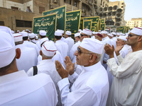 Egyptian Muslims parade to celebrate Moulid Al-Nabi, the birthday of the Prophet Muhammad, in Cairo, Egypt, on September 15, 2024. (