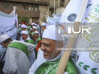 Egyptian Muslims parade to celebrate Moulid Al-Nabi, the birthday of the Prophet Muhammad, in Cairo, Egypt, on September 15, 2024. (