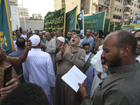 Egyptian Muslims parade to celebrate Moulid Al-Nabi, the birthday of the Prophet Muhammad, in Cairo, Egypt, on September 15, 2024. (