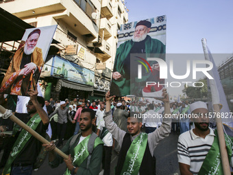 Egyptian Muslims parade to celebrate Moulid Al-Nabi, the birthday of the Prophet Muhammad, in Cairo, Egypt, on September 15, 2024. (