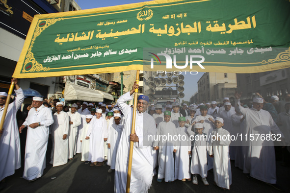 Egyptian Muslims parade to celebrate Moulid Al-Nabi, the birthday of the Prophet Muhammad, in Cairo, Egypt, on September 15, 2024. 