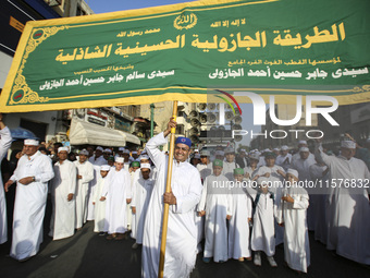 Egyptian Muslims parade to celebrate Moulid Al-Nabi, the birthday of the Prophet Muhammad, in Cairo, Egypt, on September 15, 2024. (