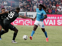 Gianluca Gaetano (#70 Cagliari Calcio) and Frank Anguissa (Napoli SSC) during the Serie A TIM match between Cagliari Calcio and Napoli SSC i...