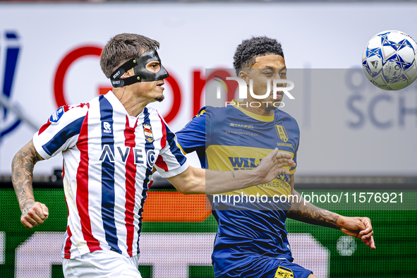 Willem II player Mickael Tirpan and RKC player Richonell Margaret during the match Willem II vs. RKC at the Koning Willem II stadium for the...