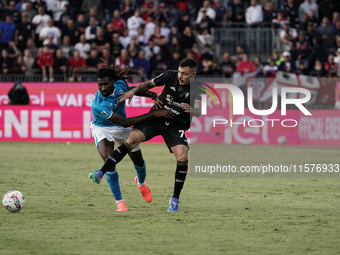 Gianluca Gaetano (#70 Cagliari Calcio) and Frank Anguissa (Napoli SSC) during the Serie A TIM match between Cagliari Calcio and Napoli SSC i...