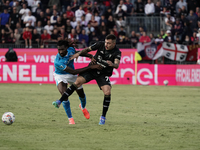 Gianluca Gaetano (#70 Cagliari Calcio) and Frank Anguissa (Napoli SSC) during the Serie A TIM match between Cagliari Calcio and Napoli SSC i...