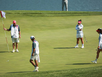 GAINESVILLE, VIRGINIA - SEPTEMBER 14: Megan Khang of the United States follows her putt on the 11th green during Fourball Matches on Day Two...