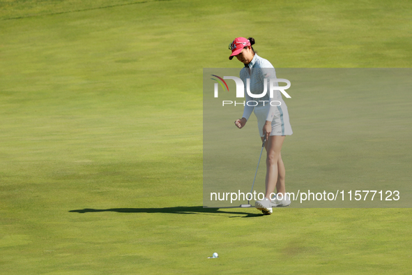 GAINESVILLE, VIRGINIA - SEPTEMBER 14: Rose Zhang of the United States follows her putt on the 11th green during Fourball Matches on Day Two...