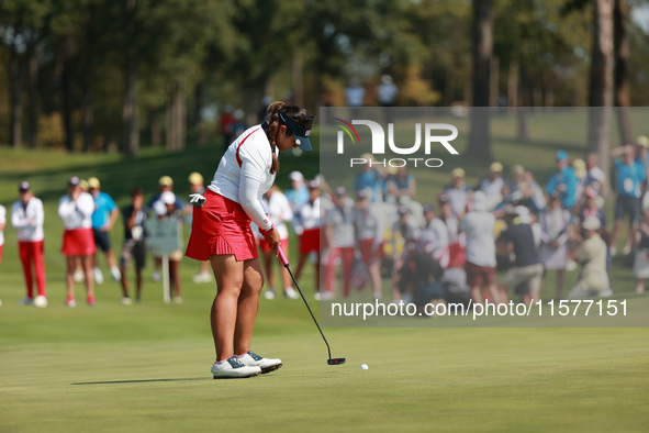 GAINESVILLE, VIRGINIA - SEPTEMBER 15: Lilia Vu of of Team USA follows her putt on the 18th green during single matches on Day Three of the S...