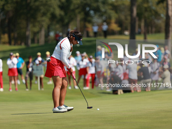 GAINESVILLE, VIRGINIA - SEPTEMBER 15: Lilia Vu of of Team USA follows her putt on the 18th green during single matches on Day Three of the S...