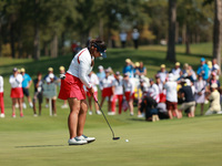 GAINESVILLE, VIRGINIA - SEPTEMBER 15: Lilia Vu of of Team USA follows her putt on the 18th green during single matches on Day Three of the S...