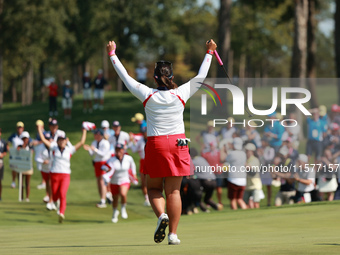 GAINESVILLE, VIRGINIA - SEPTEMBER 15: Lilia Vu of of Team USA follows her putt on the 18th green during single matches on Day Three of the S...