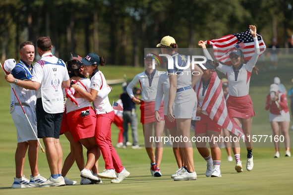 GAINESVILLE, VIRGINIA - SEPTEMBER 15: Team USA players celebrates after winning the Solheim Cup at Robert Trent Jones Golf Club on Sunday, S...