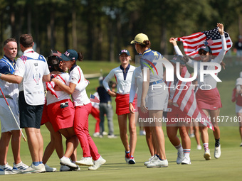 GAINESVILLE, VIRGINIA - SEPTEMBER 15: Team USA players celebrates after winning the Solheim Cup at Robert Trent Jones Golf Club on Sunday, S...