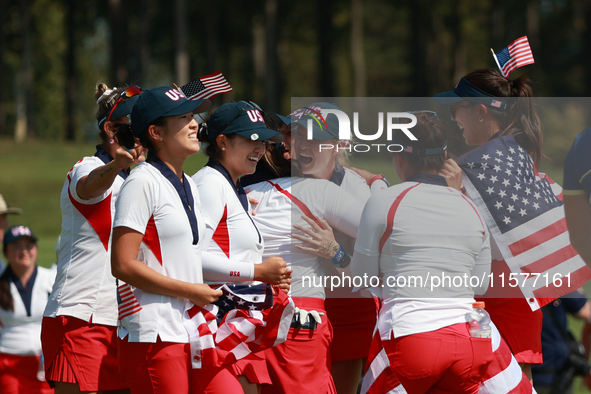 GAINESVILLE, VIRGINIA - SEPTEMBER 15: Team USA players celebrates after winning the Solheim Cup at Robert Trent Jones Golf Club on Sunday, S...