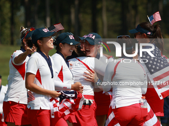 GAINESVILLE, VIRGINIA - SEPTEMBER 15: Team USA players celebrates after winning the Solheim Cup at Robert Trent Jones Golf Club on Sunday, S...