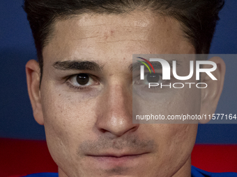 Julian Alvarez of Atletico de Madrid sits on the bench during the La Liga EA Sports 2024/25 football match between Atletico Madrid and Valen...