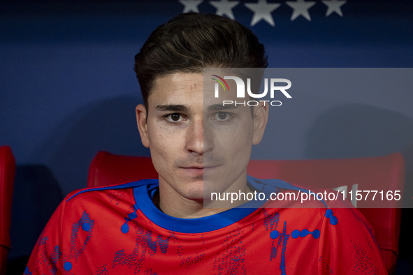 Julian Alvarez of Atletico de Madrid sits on the bench during the La Liga EA Sports 2024/25 football match between Atletico Madrid and Valen...