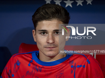 Julian Alvarez of Atletico de Madrid sits on the bench during the La Liga EA Sports 2024/25 football match between Atletico Madrid and Valen...