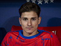 Julian Alvarez of Atletico de Madrid sits on the bench during the La Liga EA Sports 2024/25 football match between Atletico Madrid and Valen...