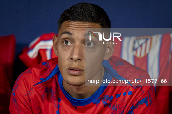 Nahuel Molina of Atletico de Madrid sits on the bench during the La Liga EA Sports 2024/25 football match between Atletico Madrid and Valenc...