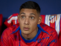 Nahuel Molina of Atletico de Madrid sits on the bench during the La Liga EA Sports 2024/25 football match between Atletico Madrid and Valenc...