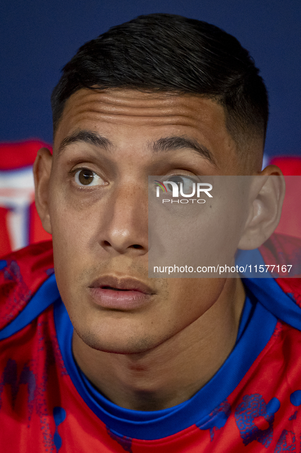 Nahuel Molina of Atletico de Madrid sits on the bench during the La Liga EA Sports 2024/25 football match between Atletico Madrid and Valenc...