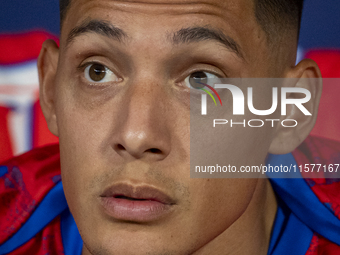 Nahuel Molina of Atletico de Madrid sits on the bench during the La Liga EA Sports 2024/25 football match between Atletico Madrid and Valenc...