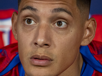 Nahuel Molina of Atletico de Madrid sits on the bench during the La Liga EA Sports 2024/25 football match between Atletico Madrid and Valenc...