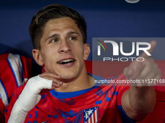 Giuliano Simeone of Atletico de Madrid sits on the bench during the La Liga EA Sports 2024/25 football match between Atletico Madrid and Val...