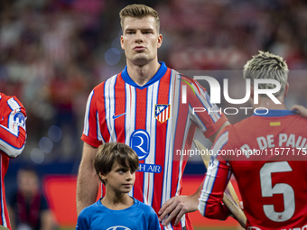 Alexander Sorloth of Atletico de Madrid stands before the La Liga EA Sports 2024/25 football match between Atletico Madrid and Valencia CF a...