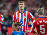 Alexander Sorloth of Atletico de Madrid stands before the La Liga EA Sports 2024/25 football match between Atletico Madrid and Valencia CF a...