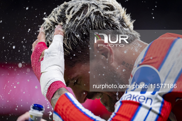 Rodrigo De Paul of Atletico de Madrid hydrates before the La Liga EA Sports 2024/25 football match between Atletico Madrid and Valencia CF a...