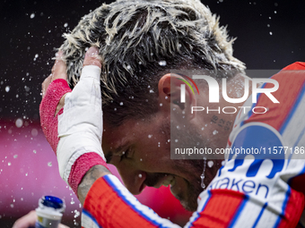 Rodrigo De Paul of Atletico de Madrid hydrates before the La Liga EA Sports 2024/25 football match between Atletico Madrid and Valencia CF a...