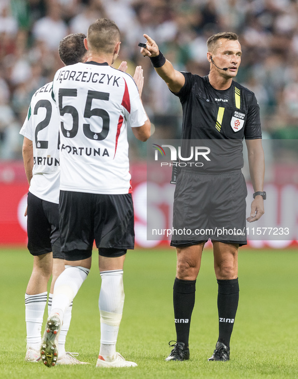 Jurgen Celhaka, Artur Jedrzejczyk, Referee Jaroslaw Przybyl during Legia Warsaw vs Rakow Czestochowa - PKO  Ekstraklasa match in Warsaw, Pol...